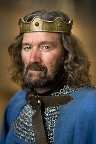 Man blue suit gold crown - free christmas wallpaper for mobile