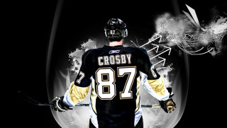 Hockey player black uniform yellow - gritty free wallpaper