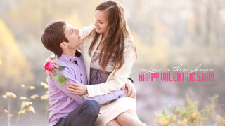 Man woman bench kissing rose - free valentines wallpaper
