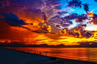 Colorful sunset beach people walking - colorful cloud free wallpaper