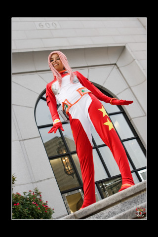 Woman red white outfit ledge - outside free wallpaper