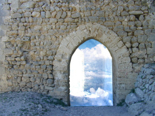 Stone wall window sky reflection - liminal space free wallpaper