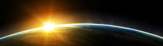 Bright sun earth horizon space - a bright sun free wallpaper