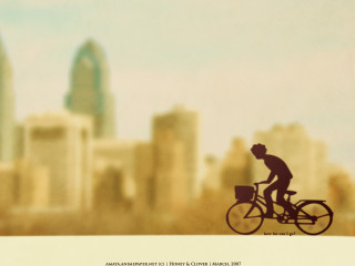 Man bike city skyline blurry - free city wallpaper