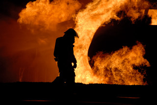 Firefighter large fire flames background - flame free wallpaper