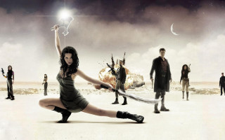 Woman holding sword desert group - a star in the sky free wallpaper