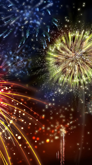 Colorful fireworks display night sky - free new year wallpaper for mobile