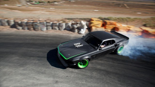 Black car green wheels road - in the background free wallpaper