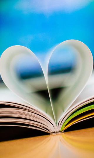 Book heart pages table blurry 2 - a book free wallpaper for mobile