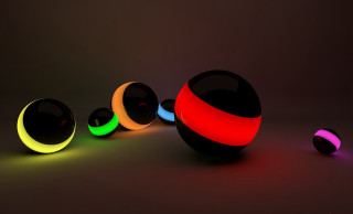Colorful balls dark room black - a group of balls free wallpaper