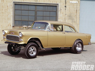 Tan car parked building street - kodachrome free wallpaper