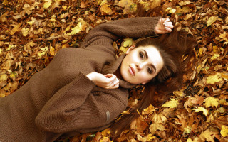 Woman leaves autumn fire lying - anna hotchkis free wallpaper