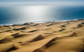 Ocean desert sand dune sun - a view of the ocean free wallpaper for desktop