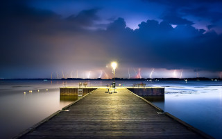 Pier light night clouds city - thunderstorm free wallpaper for desktop