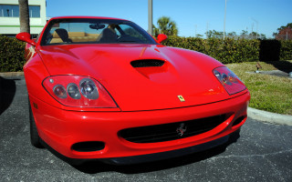 Red sports car parking lot 11 - a red bow free wallpaper for desktop