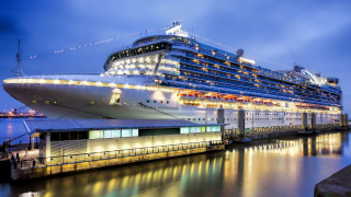 Cruise ship night cityscape tilt 2 - a large cruise ship free wallpaper