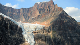 Mountain glacier cloudy sky landscape - a few snow free wallpaper