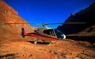 Helicopter rocky mountains canyon sunset - a helicopter free wallpaper