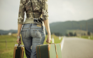 Woman suitcases camera road camouflage - liminal free wallpaper