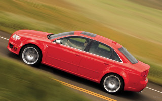 Red car driving road grass - a field of grass and trees free wallpaper for desktop