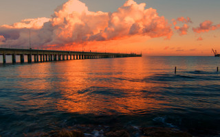 Bridge sunset water boat city - a boat in the distance free wallpaper