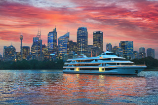 Large boat lake sunset city - rich moody colour free wallpaper