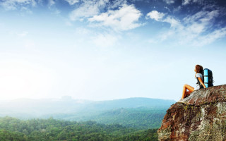 Person sitting mountains sky nature - a sky background and a person free wallpaper
