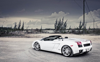 White sports car parking lot 19 - luxury free wallpaper