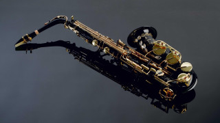 Saxophone black gold reflection flemish - a black body free wallpaper
