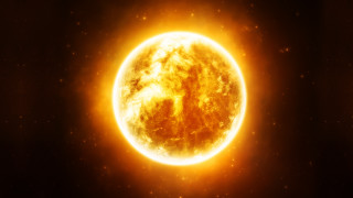 Bright yellow sun black background - a yellow circle free wallpaper