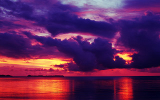 Sunset clouds boat surfboard city - the water and a person free wallpaper for desktop