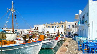 Boats water building chairs tables 2 - a couple of boats free wallpaper