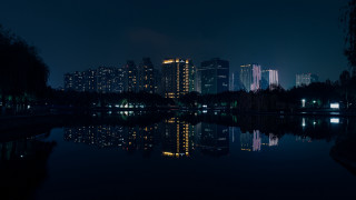 Cityscape night lake reflection architecture - reflective free wallpaper