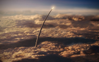 Rocket clouds sky dusk city - a rocket free wallpaper