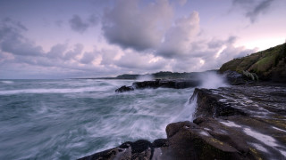 Rocky shore waves misty island - against the rock free wallpaper