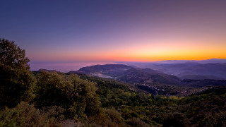 Sunset mountain range cityscape nature - a sunset view of a mountain range free wallpaper