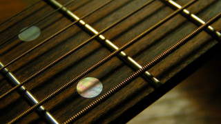 Guitar neck closeup blurry frets - grunge free wallpaper