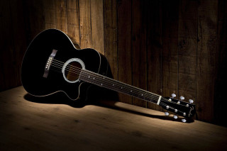 Guitar wooden table spotlight wall - a wooden table free wallpaper