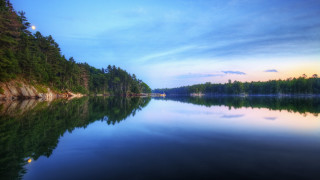 Lake forest sky clouds foreground - a forest in the background free wallpaper