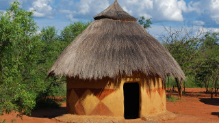 Thatched hut dirt field forest - a hut free wallpaper