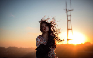 Woman wind sunset tower portrait - a tower in the background free wallpaper
