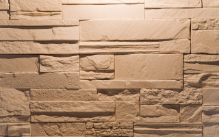 Stone wall light clock texture - an abstract sculpture free wallpaper