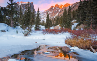 Snowy forest stream mountains sunset - a stream free wallpaper for desktop