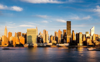 City skyline water boat digital - a body of water in front free wallpaper for desktop