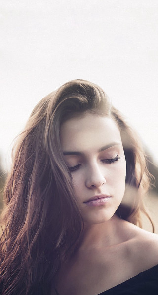 Woman longhair cellphone field portrait - head and shoulders portrait free wallpaper for mobile