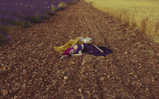 Wheat field dreamlike blonde girls - a purple sky in the background free wallpaper for desktop