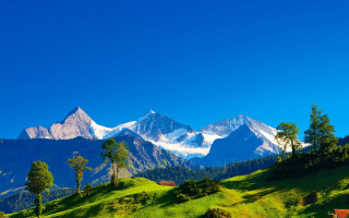 Green hills mountains clouds castle - a mountain range in the background free wallpaper for desktop