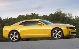 Yellow sports car nature road - a cloudy sky free wallpaper for desktop