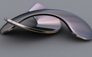 Metal curved kinetic abstract sculpture - a metal object free wallpaper