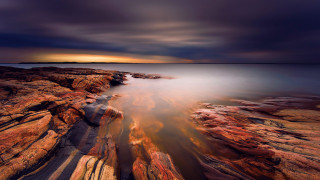 Rocky beach sunset mystical colors 2 - a long exposure free wallpaper